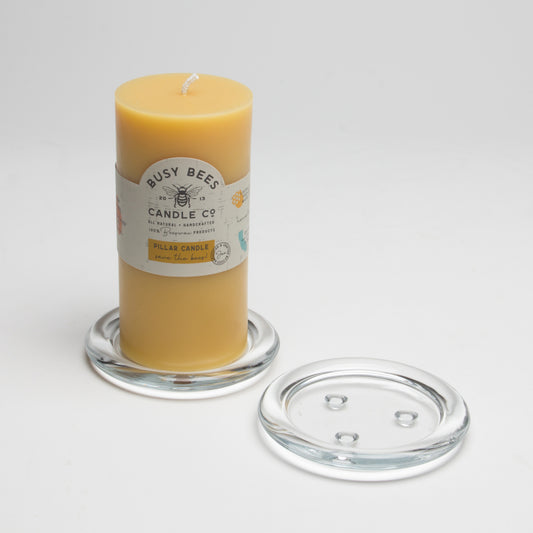 3" Pillar Candle on 4" Plate with empty 4" plate next to it.